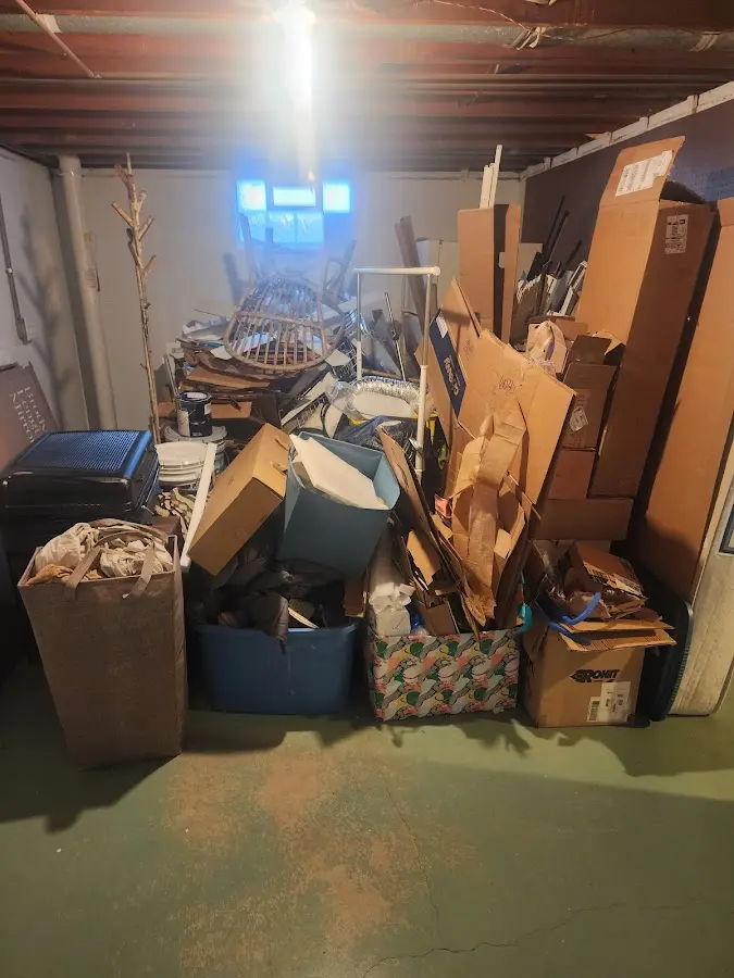 Roll-off dumpster container at job site for 4 Yard Dumpster Rental in Cedar Hills